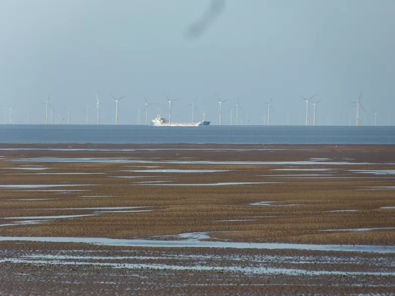 image of Fleetwood & Morecambe Bay with ship and wind turbines in the background